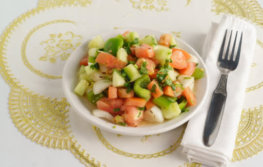 Cucumber salad and sides for an Indian catering buffet