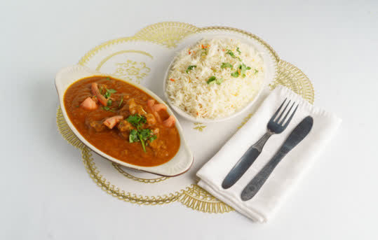 Slow-cooked lamb curry prepared for catering