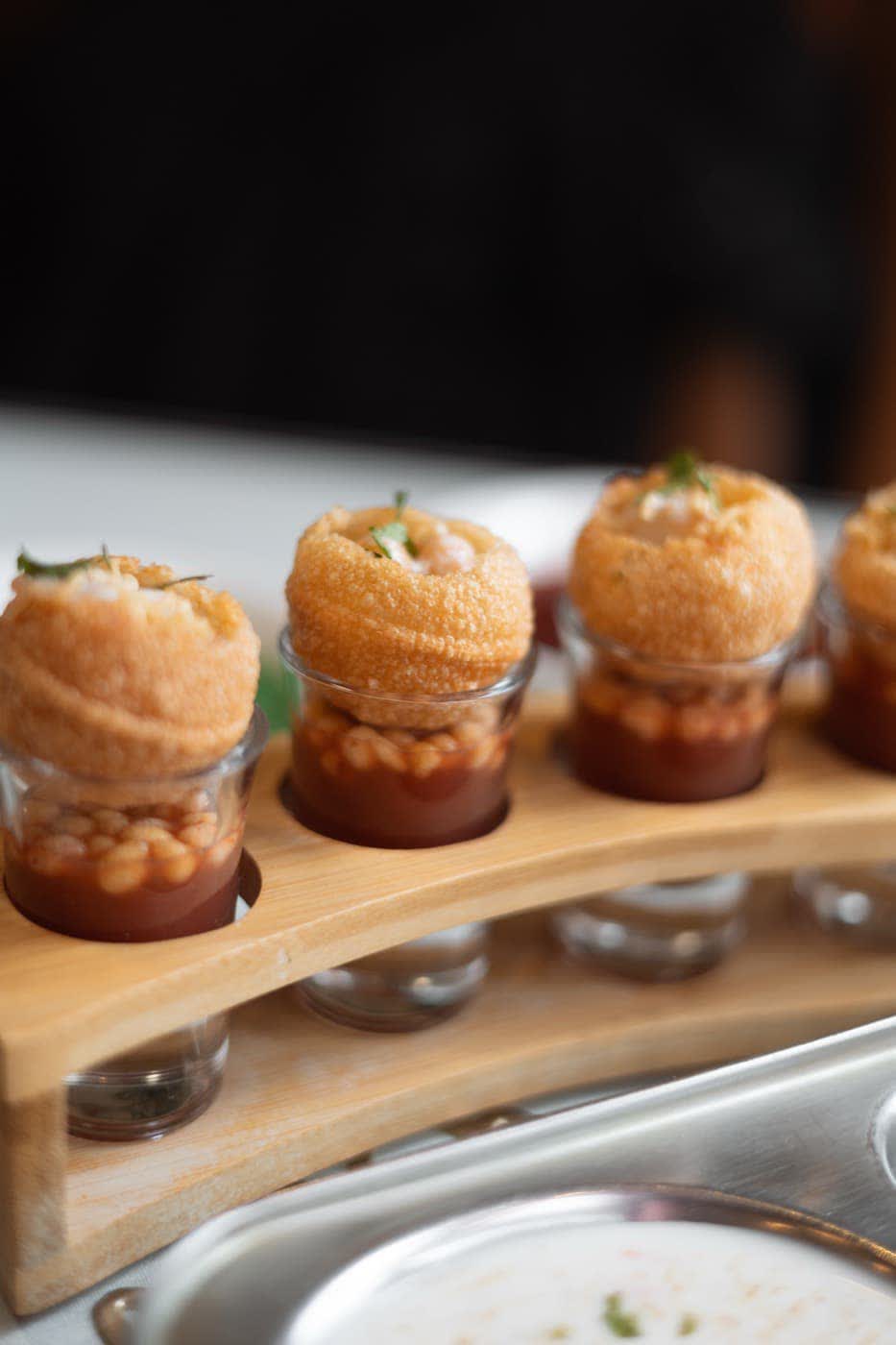 Pani puri appetisers plated for an event